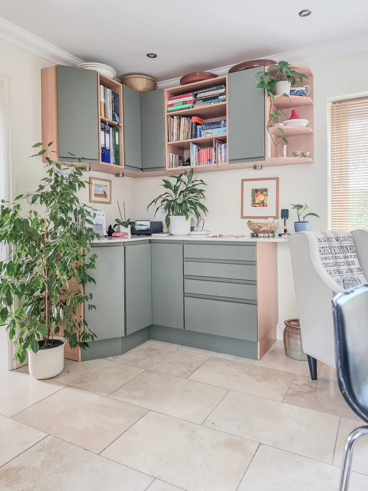 Matching sage green desk and shelving run refreshed with replacement doors