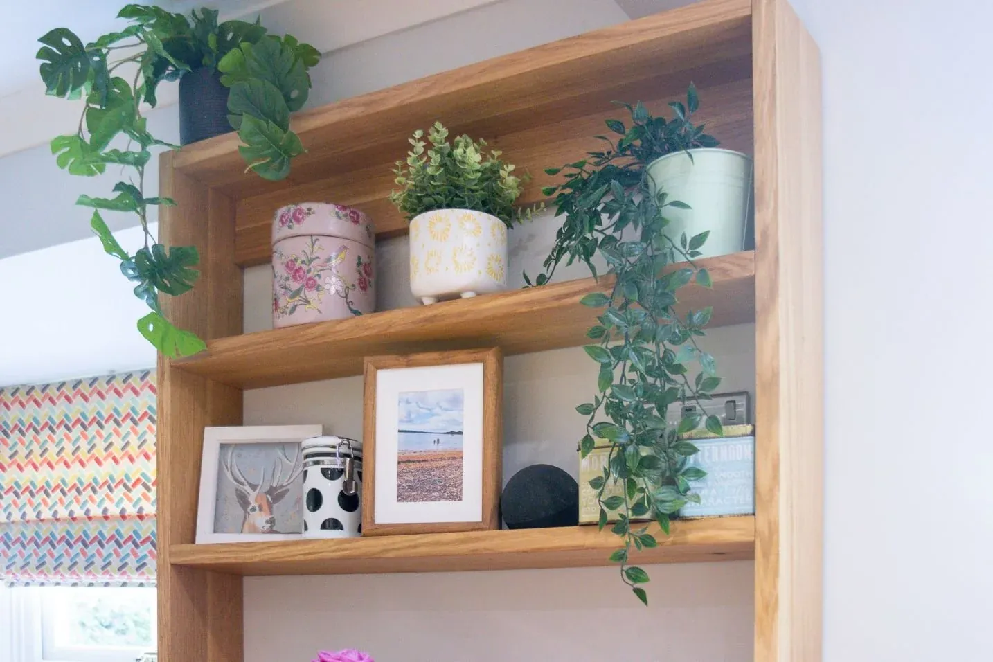 Bespoke solid oak shelving unit made in the workshop