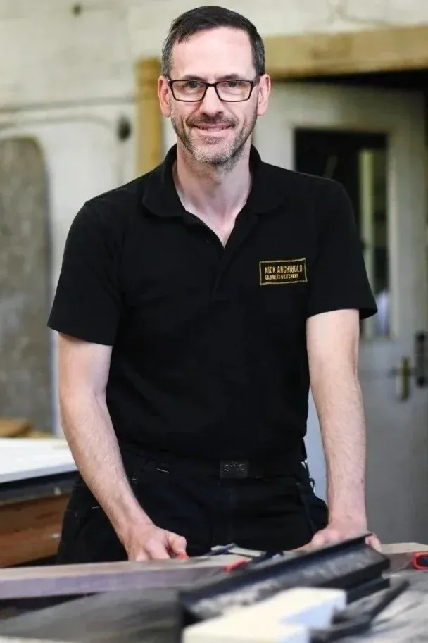 Nick Archibold, cabinetmaker, in his workshop