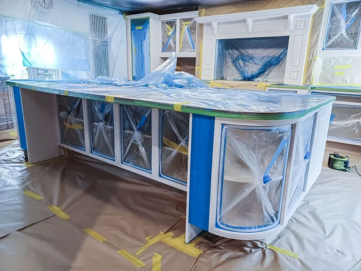 Kitchen cabinet frames and doors in a smooth sprayed painted finish
