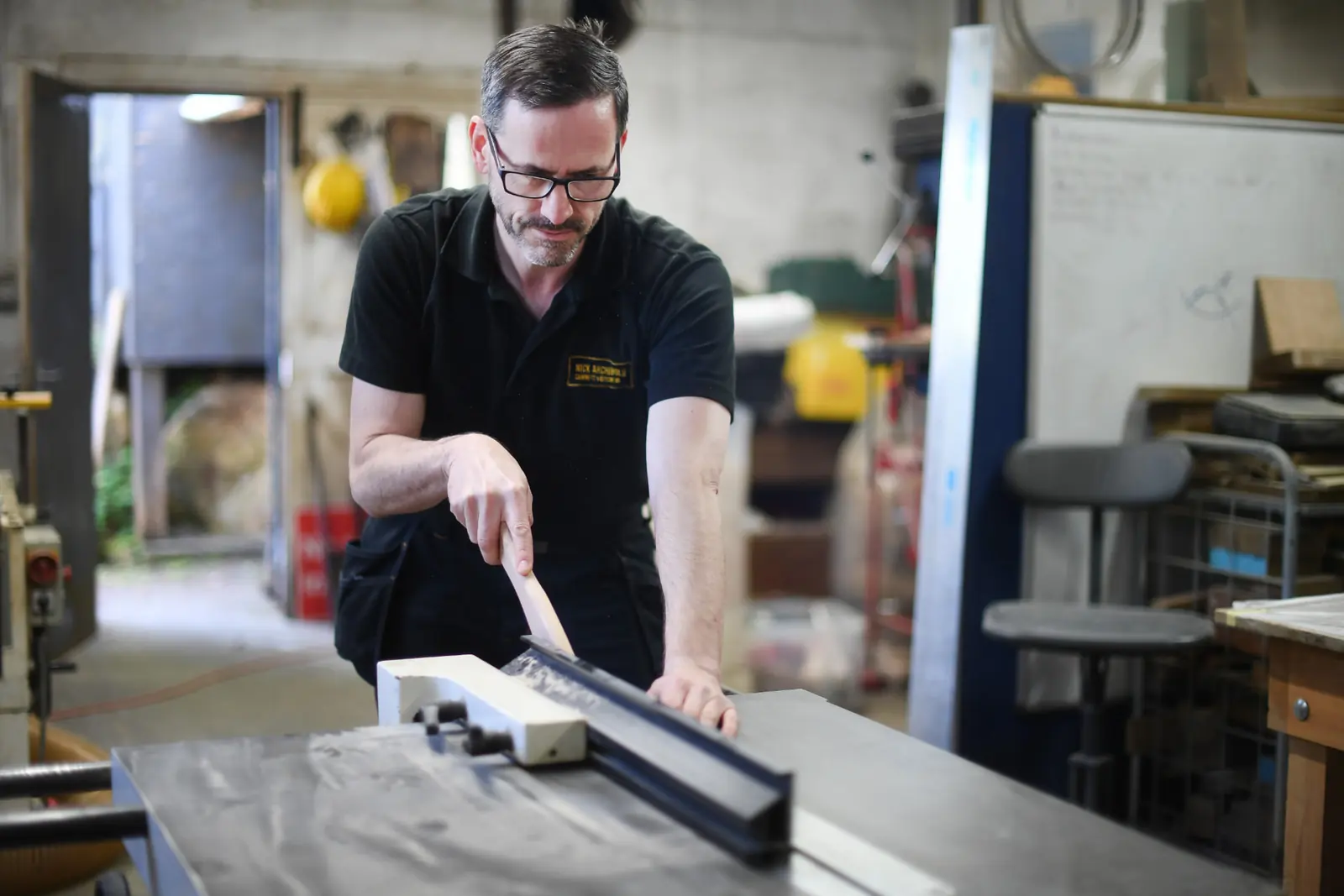 Nick Archibold working at the workshop bench